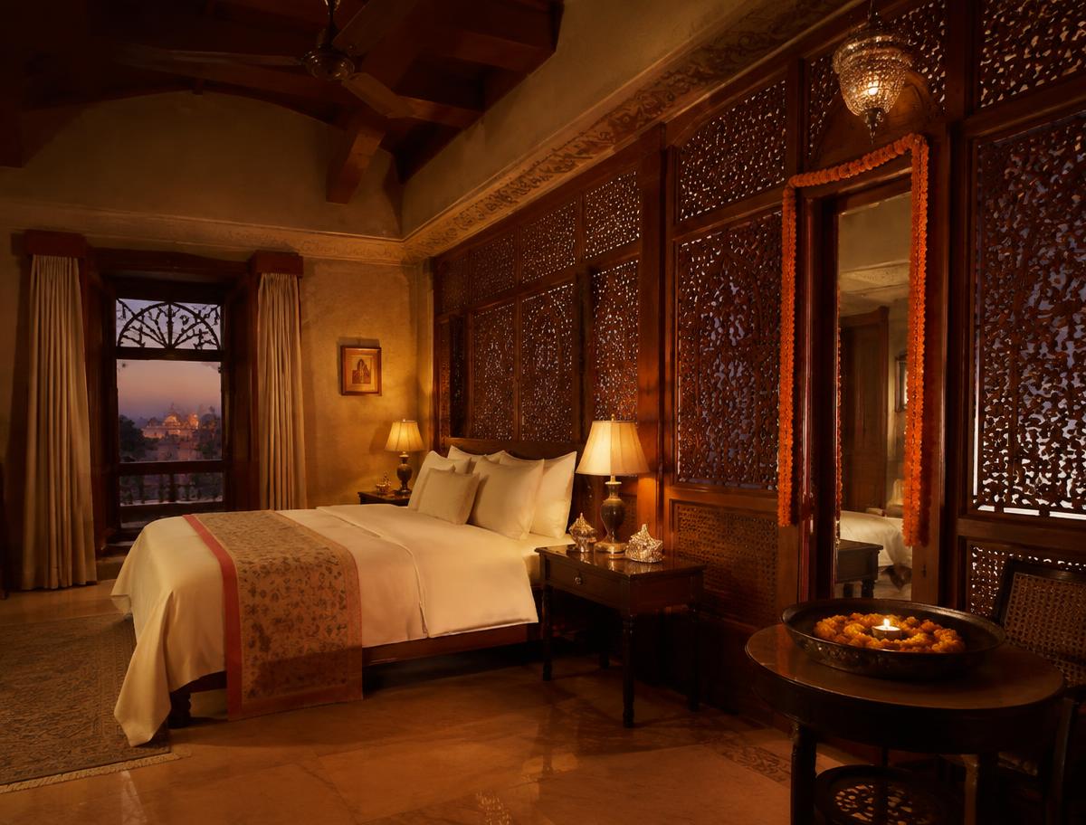 Heritage luxury suite with carved screens and warm lamps